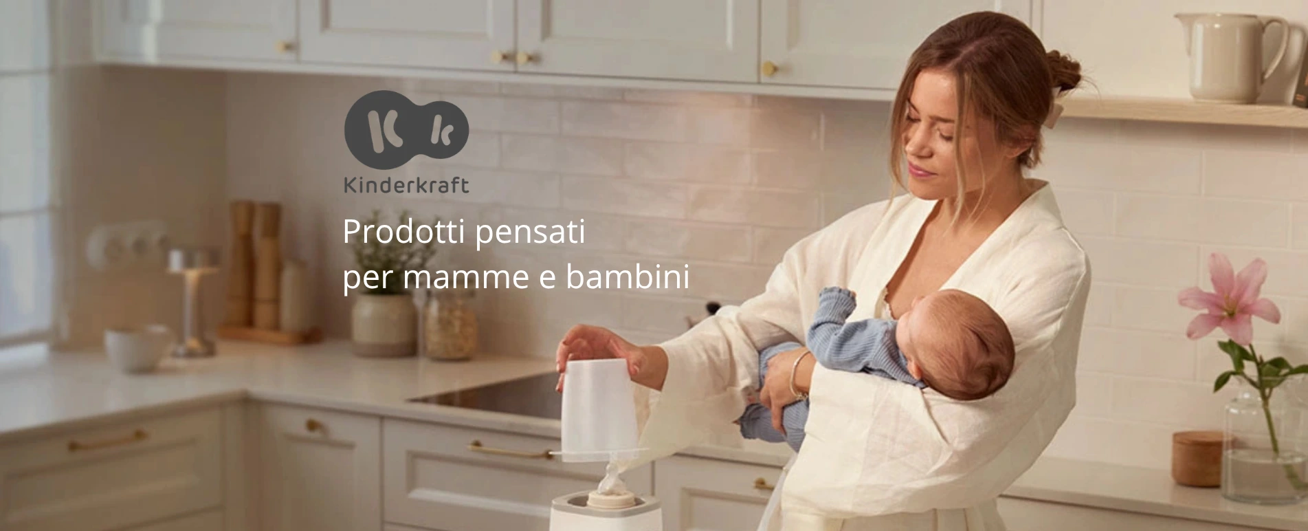Mamma con bimbo in braccio che prepara il latte artificiale con macchinario kinder Kraft